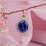 Pingente com diamantes e safiras. Bicolor