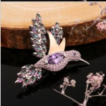 Broche en argent avec "Colibri" doré. Zircone