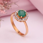 Gold ring with diamonds and emerald