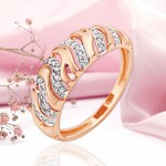 Zlatý prsten 585 červené zlato se zirkony