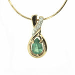 Gold pendant with emerald and diamonds