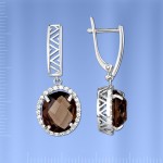 Silberne Ohrringe mit Anhänger. Rauchtopas