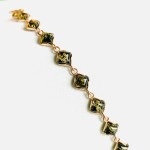 Gold-plated silver bracelet with green amber