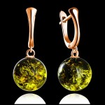 Gold-plated silver earrings "Secret". Green amber
