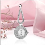 Montre pendentif en argent. Zircone