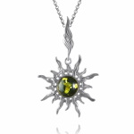 Silver pendant with green amber