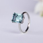 Laconic ring with blue topaz octagon in white gold