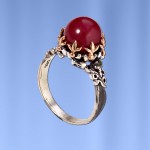 Silver ring with ruby ​​and emerald