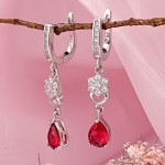 Купить серебряные серьги-подвески с цирконием.