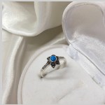 Серебряное кольцо "Цветок". Бирюза и Марказит