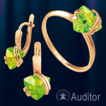 Комплект из красного золота с хризолитом