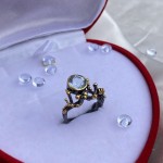 Pozlacený stříbrný prsten s topazem