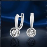 Серьги из белого золота "Калейдоскоп" с танцующим бриллиантом