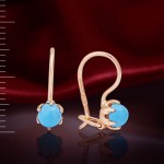 Earrings with turquoise. Red gold