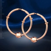 Серьги-кольца из розового золота с бриллиантовой огранкой