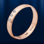 Ruský snubní prsten vyrobený ze zlata s diamantem