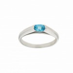 Stylish and laconic ring with topaz