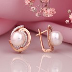 Perles et zircons cubiques. Boucles d'oreilles en or "Galaxie"
