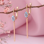 Rose gold earrings with topaz