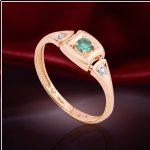 Gold ring with diamonds, emerald