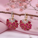 Yellow gold earrings with diamonds and ruby