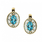 Golden earrings with topazes