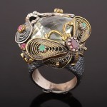 Silver ring. Prasiolite, rubies, emeralds