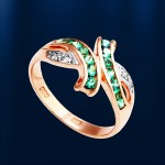 Zlatni prsten s dijamantima i smaragdom