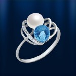 Ring made of white gold with pearls & topazes