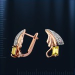 Earrings with zircon. Bicolor