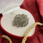 Silver brooch with marcasite