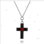 Серебряное колье с подвеской-крестиком из янтаря
