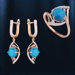 Set with turquoise. Red gold