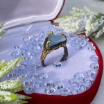 Pozlačen srebrn prstan z akvamarinom