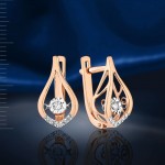 Золотые серьги с танцующими бриллиантами