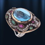 Ring with topaz ruby ​​and emerald silver