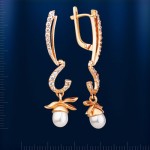 Earrings made of red gold with pearls and fianites