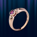 Gold ring with amethyst and zirconia.