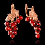 Vergulde zilveren oorbellen met amber “bessen”