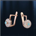Earrings with turquoise. Bicolor