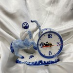 Gzel porcelain clock "Schuetze"