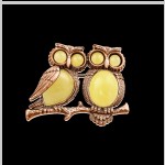 Broche en argent plaqué or "Chouettes"