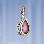 Pendant with garnet. Silver