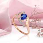 Gold ring "Ocean". Sapphire & Cubic Zirconia