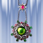 Pendant with rubies and emeralds. Silver