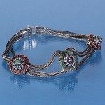 Bracelet with emeralds and rubies