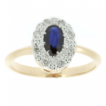 Gold ring with sapphire and diamonds.
