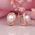 Gold earrings. Pearls and cubic zirconia