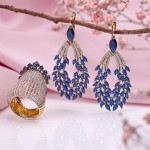 Gold set with diamonds and sapphire