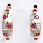 Golden earrings with rubies and diamonds